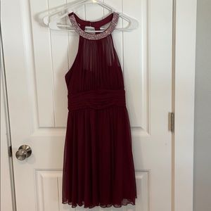 Maroon dress with stone detailing. Never worn